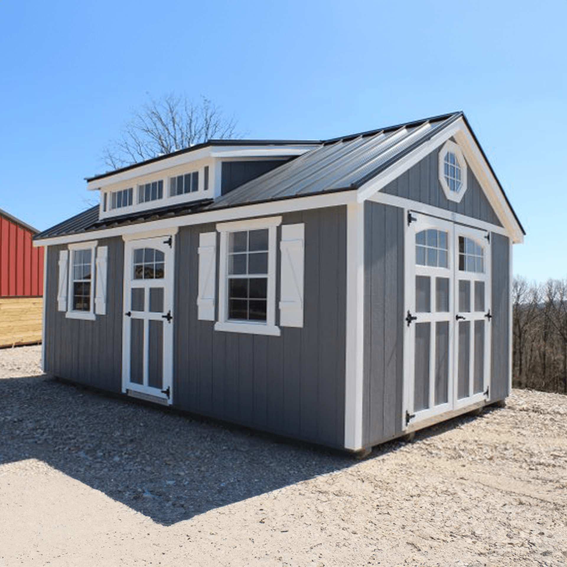 White lofted garage with black trim