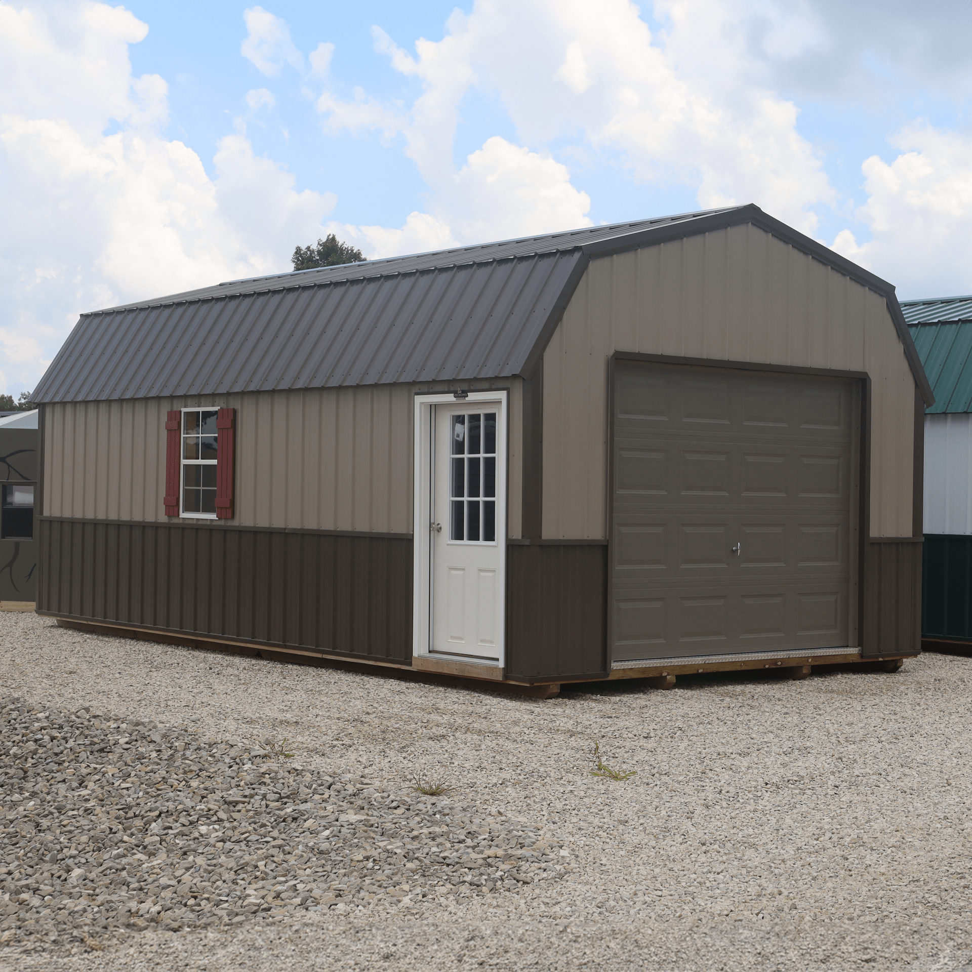 A classic metal shed with white double doors